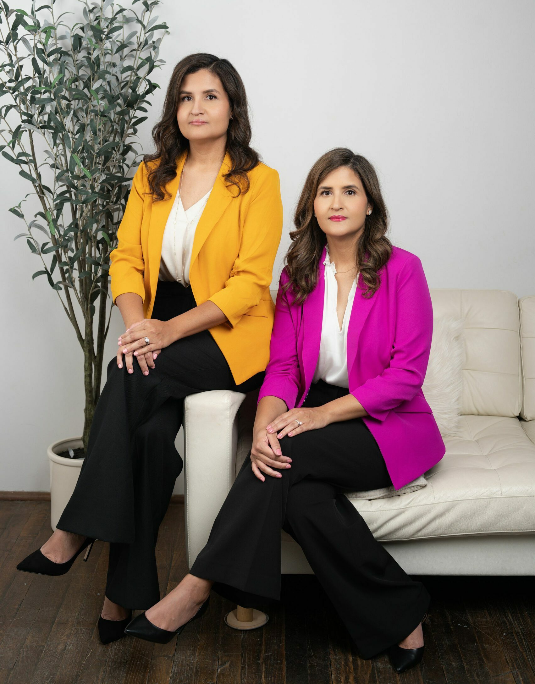 Jacqueline And Carolina Sitting In The Couch